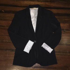 Black blazer with striped lining.